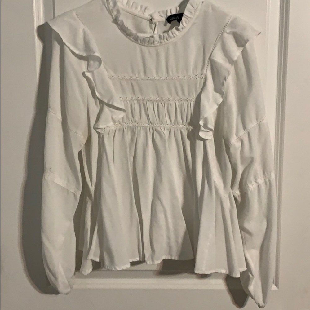 White ruffles blouse with eyelet details